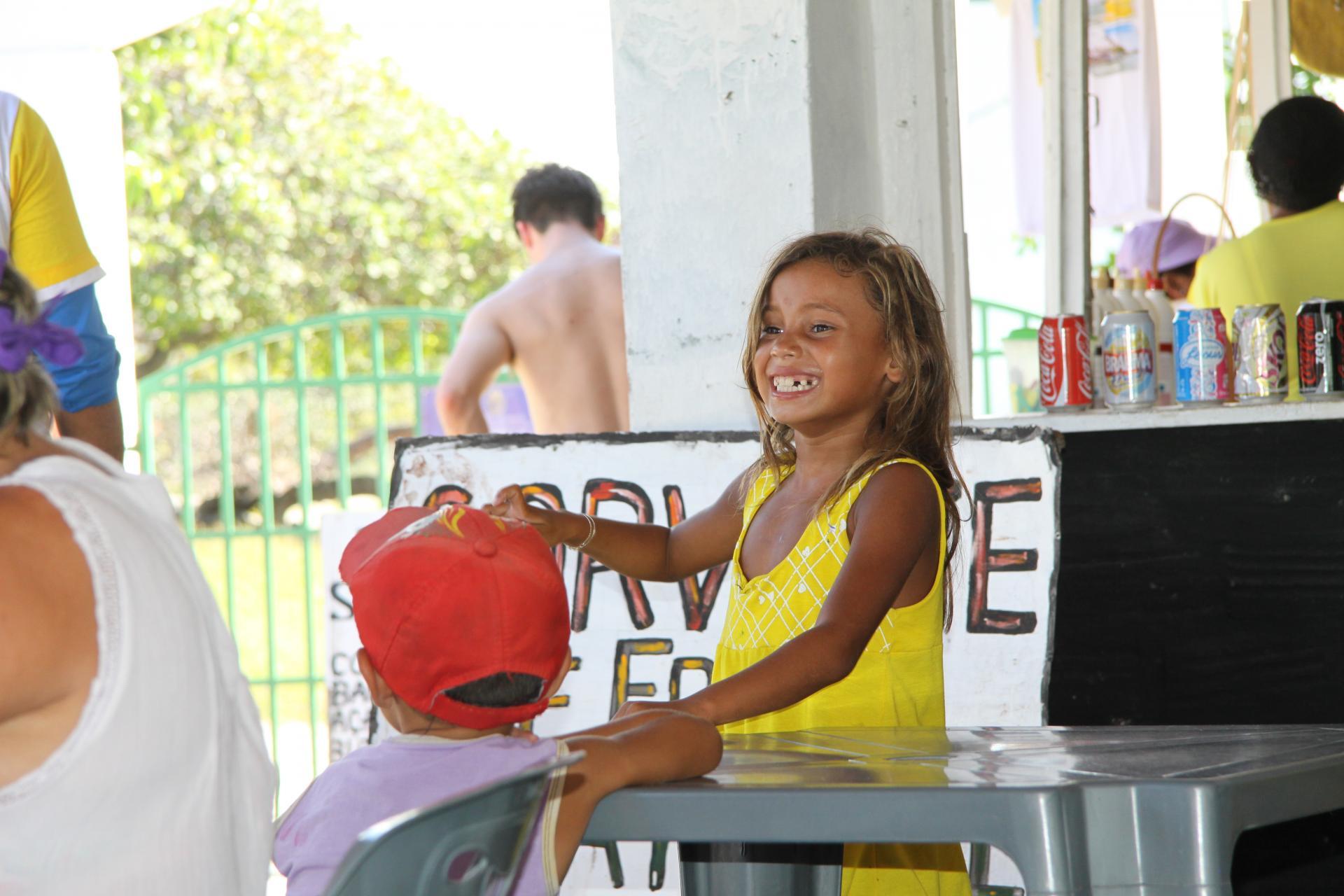 A native Brazilian letting out a hearty laugh at Lencois Maranhenses.