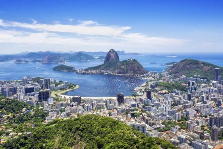 Sugarloaf Mountain in Rio de Janeiro - Iconic View over Brazil’s Coastal Metropolis Panoramic view of Rio de Janeiro with Sugarloaf Mountain, the Atlantic Ocean, and surrounding neighborhoods