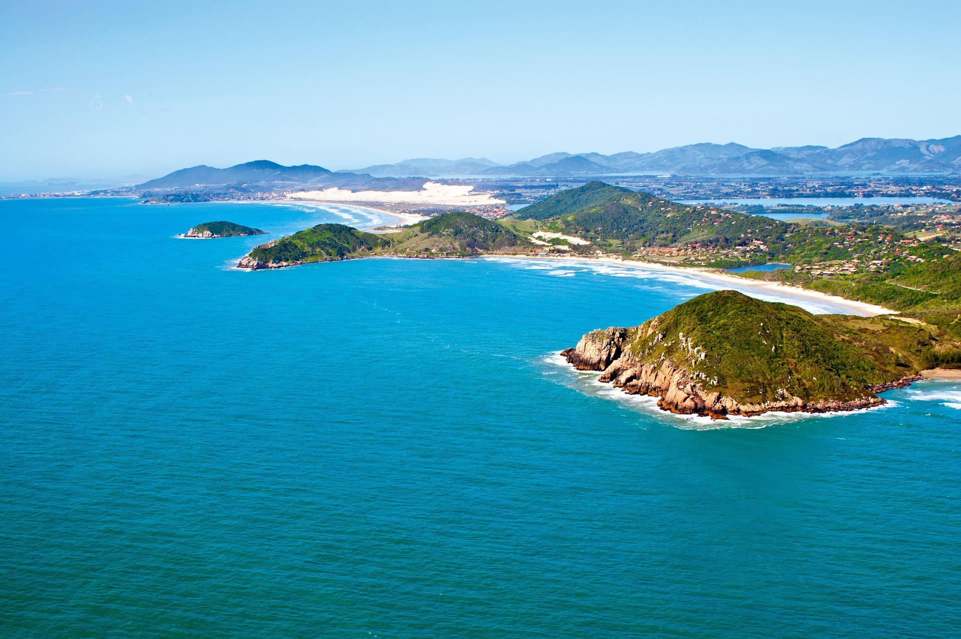 A view of Praia do Rosa from the air.