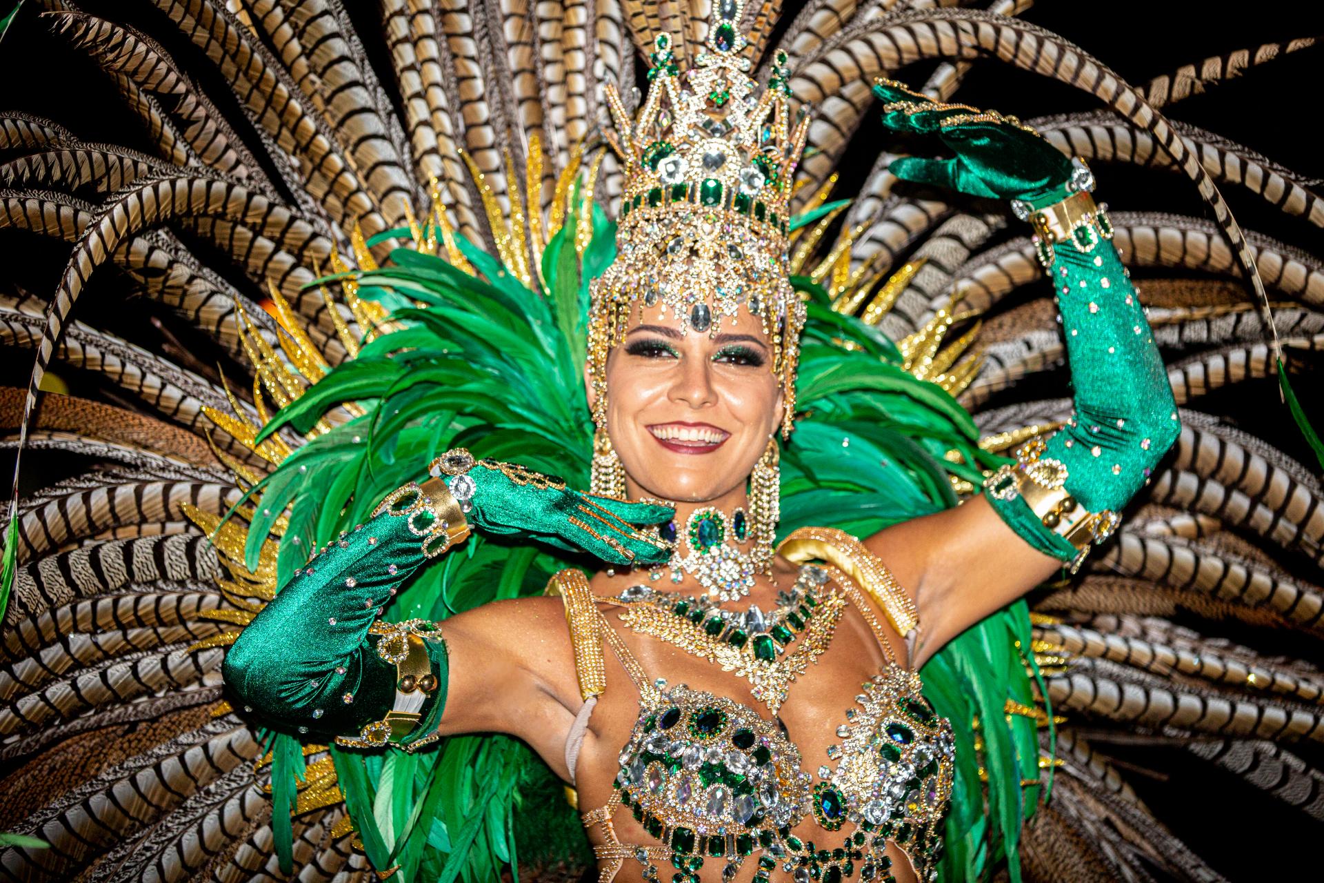 A samba dancer is splendidly dressed for the carnival in Rio de Janeiro Splendidly dressed samba dancer in Rio de Janeiro