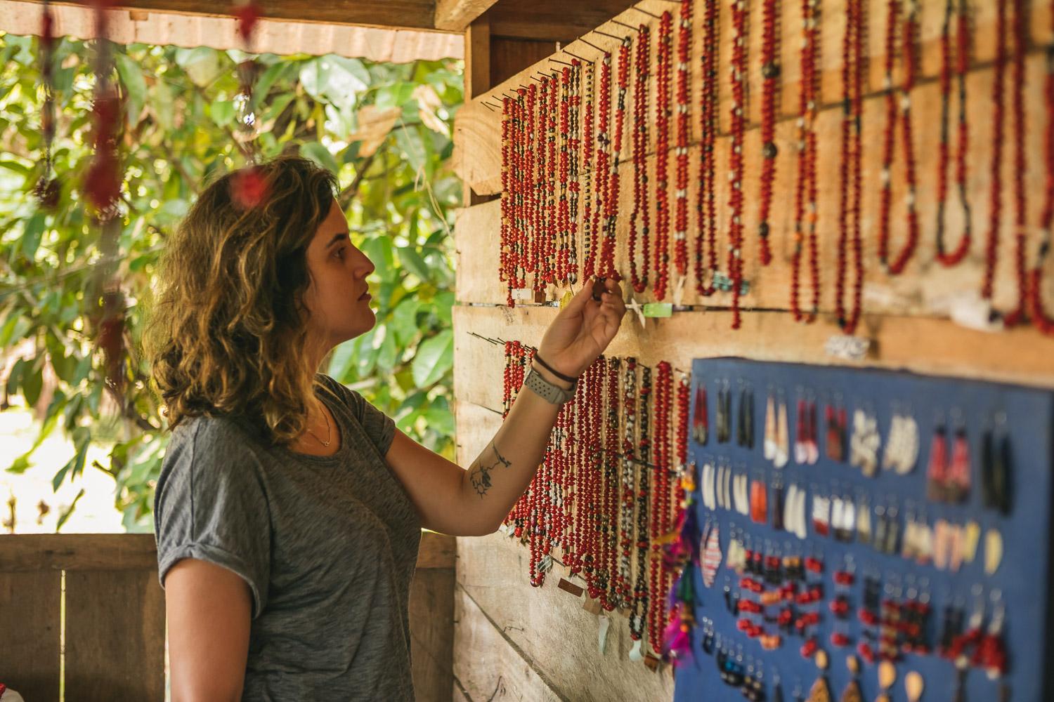 A tourist looks at different chains 