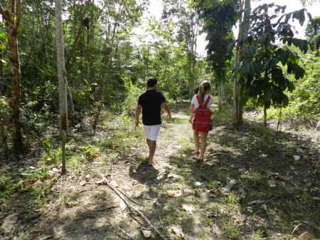 A couple walking through the jungle at Amazon Turtle Lodge