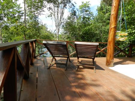 Two chairs with a nice view on the rainforest at Amazon Turtle Lodge