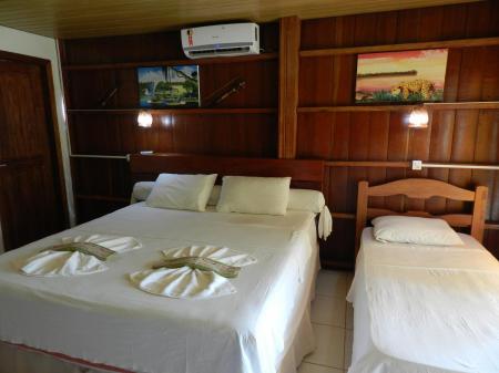 A triple room at Amazon Turtle Lodge