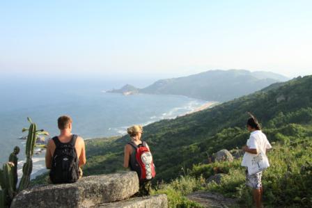 Visitors enjoying the view of the mystic rocks in Florianopolis
