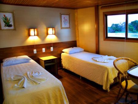 A double cabin with a nice view on board of an Amazon Clipper