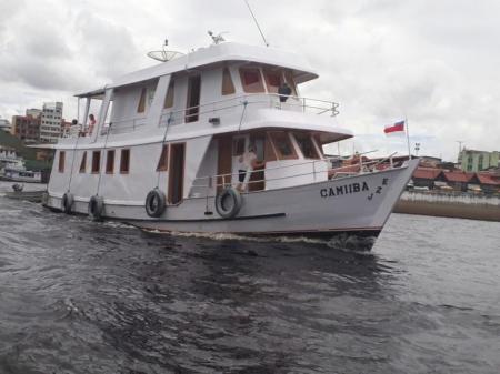 A typical Amazon Ship in front of a harbor