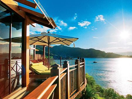 Enjoy the sundeck with view on the bay at Resort Ponta dos Ganchos