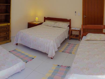 Example of a triple room at Pousada Galeria Artes in Bonito, Brazil