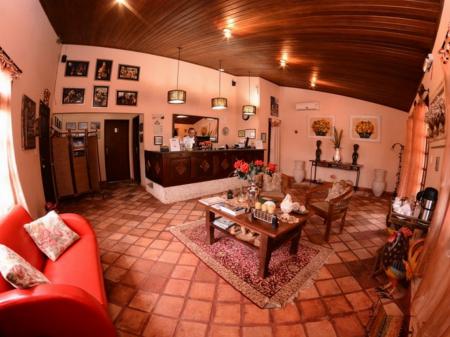 Cozy reception with sofas at Pousada Encantes do Nordeste