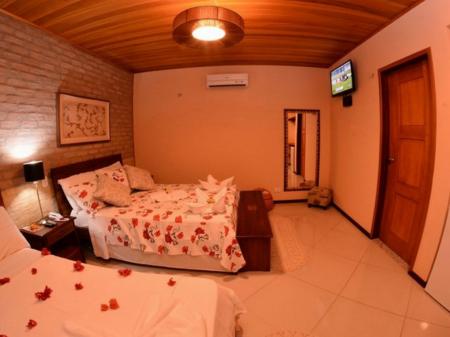 A triple room at Pousada Encantes do Nordeste 