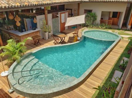 Pool and relaxing area at Pousada Casa de Praia in Praia do Forte, Bahia - Brazil
