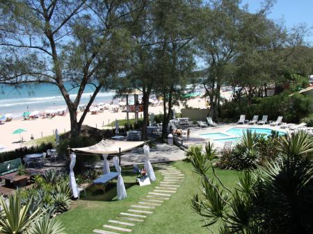 Pool with relaxing area next to the beach at Pousada dos Gravatas in Buzios, Brazil