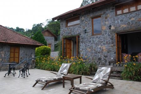 Pool area with seats at Pousada Borghetto Sant'Anna in Bento Goncalves, Brazil