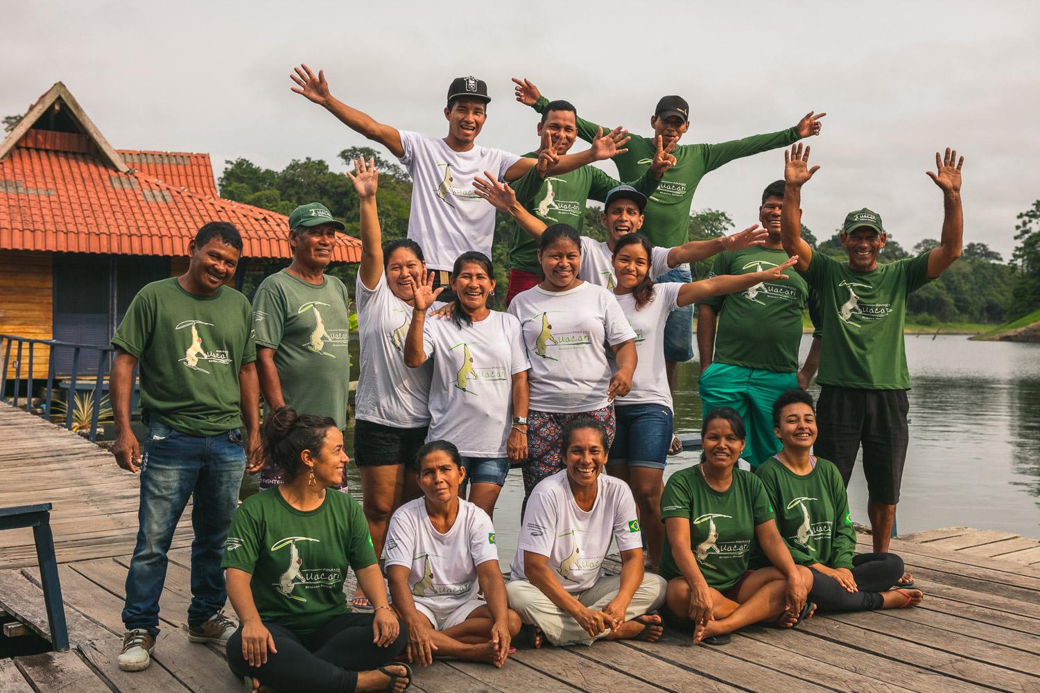 Uakari Lodge Staff in front of the floating facilities of the accommodation in the middle of the rainforest