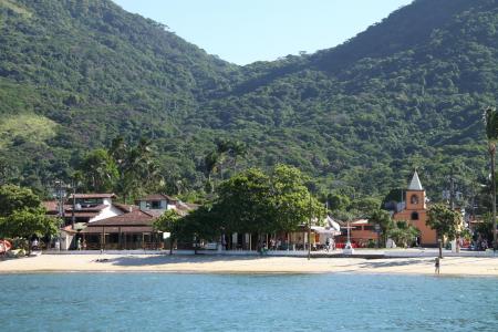 View from the sea to the village of Vila do Abraao on the Ilha Grande