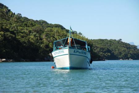 Boat on the sea in front of the Ilha Grande