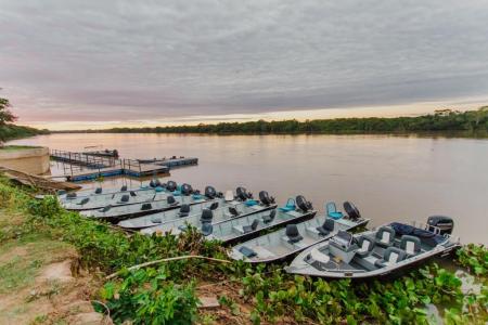 Boats on the river at Santa Rosa Lodge in the northern Pantanal, Brazil