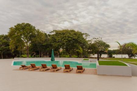 Seats at the modern pool area at Santa Rosa Lodge in the northern Pantanal, Brazil