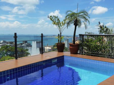 The pool with view over the city of Salvador and the sea, from Hotel Casa do Amarelindo