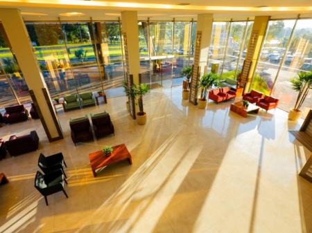 Hall and main entrance with sofas at Vivaz Cataratas Hotel Resort