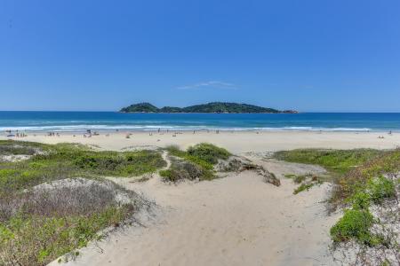 The beach of Campeche in front of at Pousada Ilha Faceira in Florianopolis