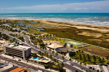 Aerial view of Hotel Celi Aracaju close to the beach in the background