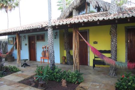 View on the simple rooms from outside at Pousada Vila Parnaiba in the Lencois Maranhenses