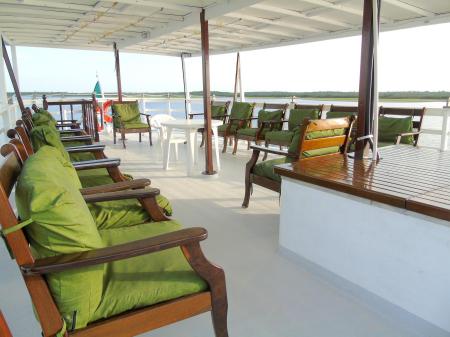 Comfortable chairs on the sun deck of motor yacht Tucano 