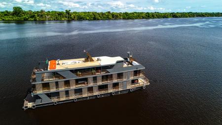 An aerial photo of the Zaltana boat on the river