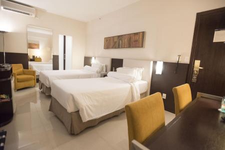 Example of a twin room in the Royal Collection Savassi Hotel 