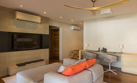 Living area in a private bungalow at Hotel Casava