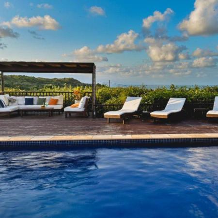 Poolside loughers at Oka de Mata hotel